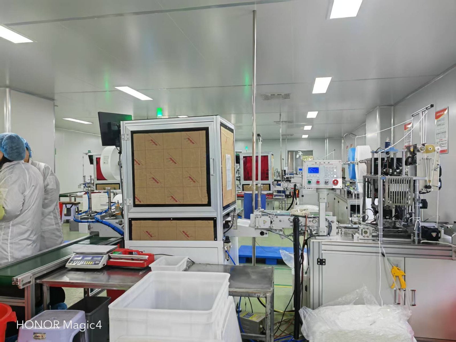 Face mask production line with automated machinery